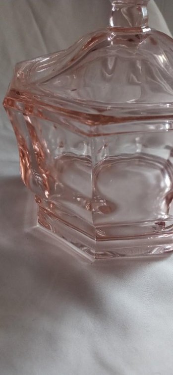 Pink octagon shaped candy dish with lid. (Depression glass reproduction)