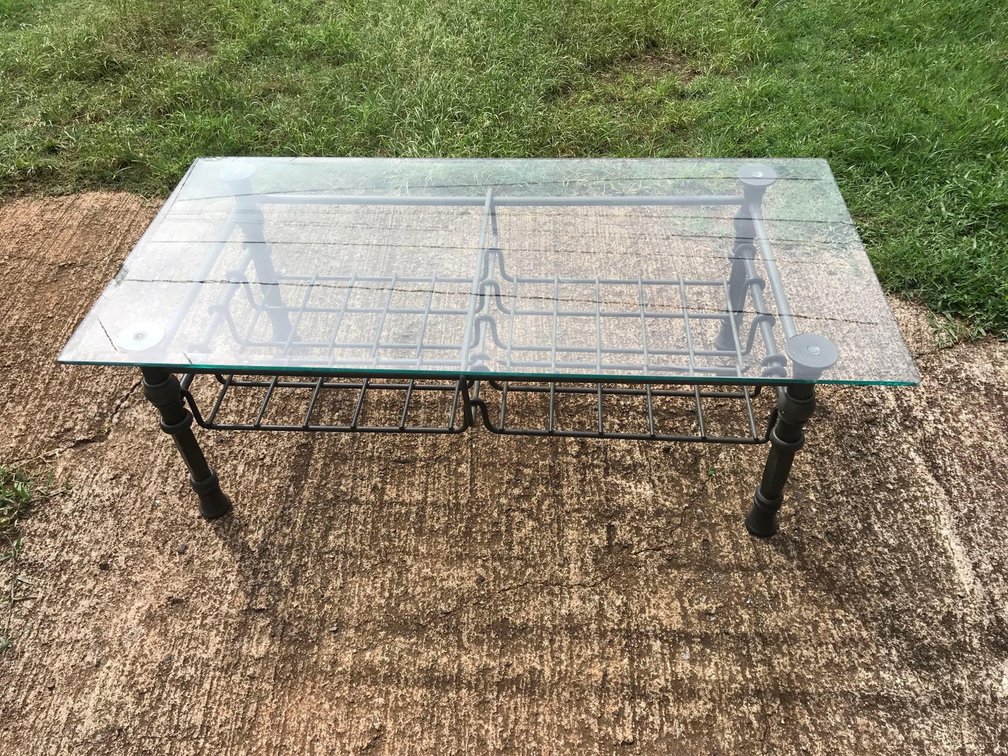 Coffee table with glass top