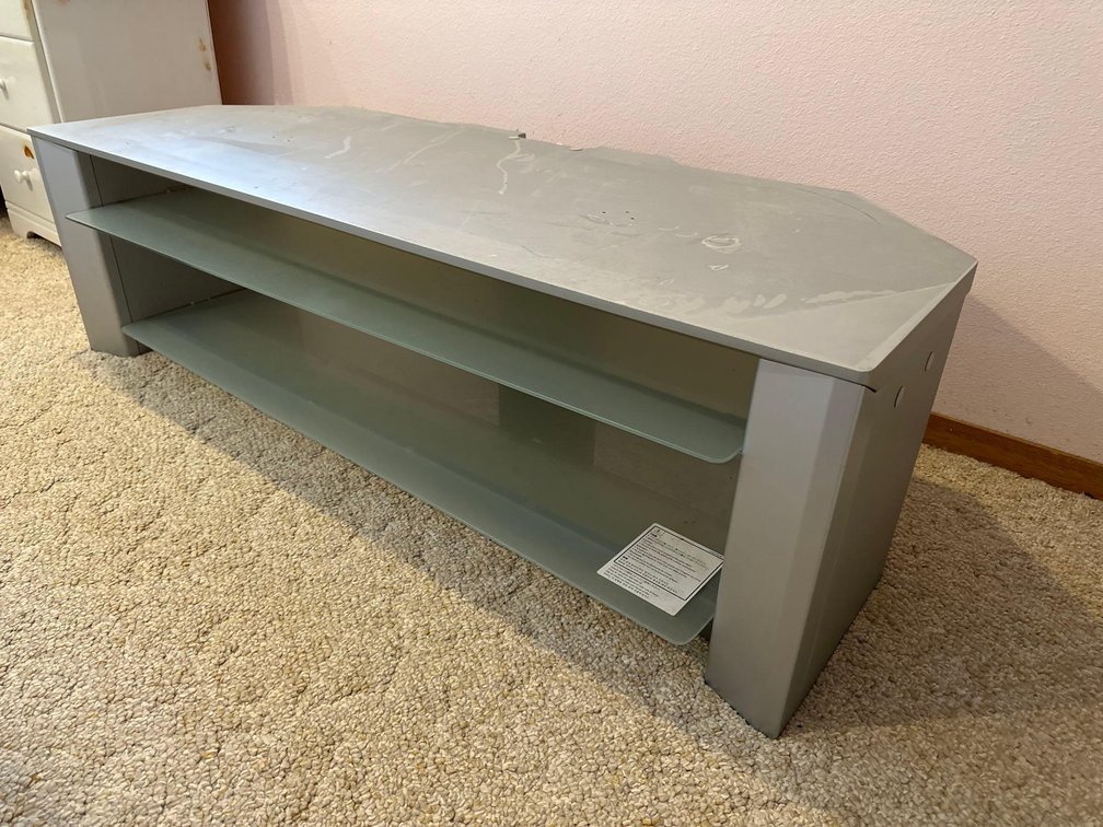 54"L x 21.5"W x 15.5"H Silver Colored Laminate TV Stand with Two Glass Shelves