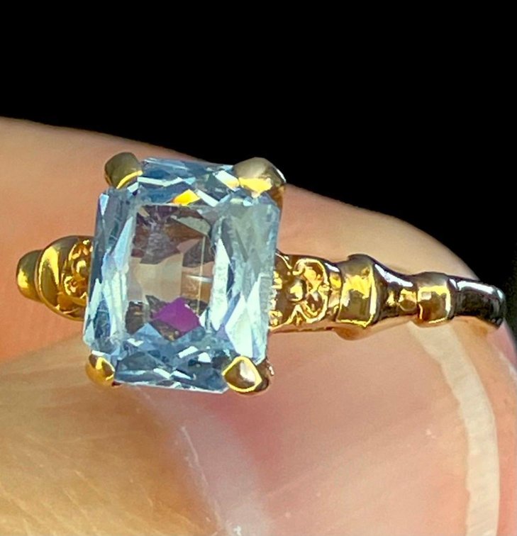 14K Gold Ring with Blue Topaz Emerald Cut