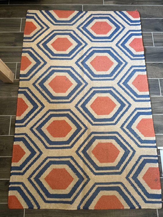 64 1/2" X 41 1/2" Blue and Coral Colored Area Rug 