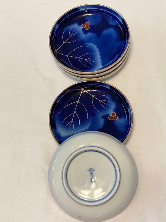 Five Small Porcelain Plates with Blue Leaf Design 