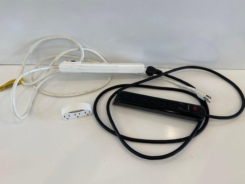 Two Power Strips and Wall Outlet