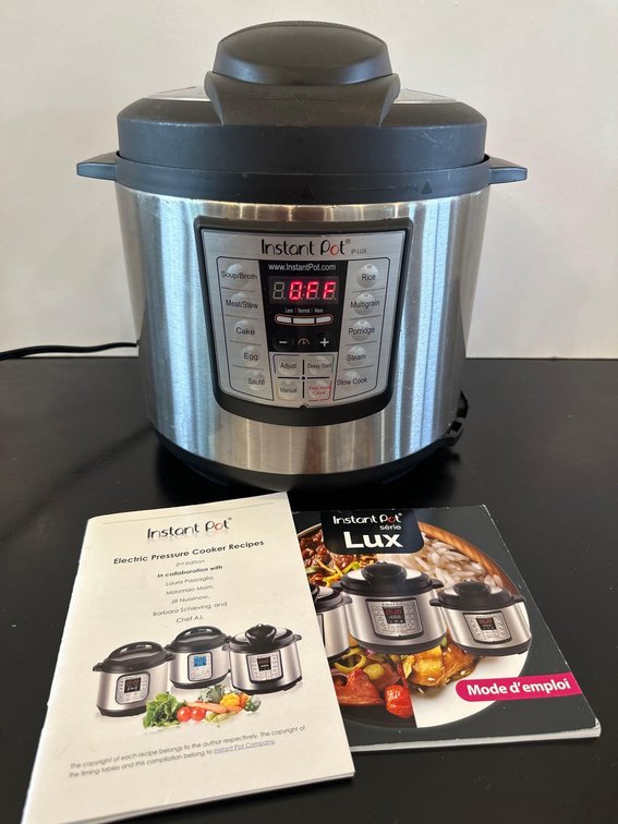 Instant Pot Electric Pressure Cooker with Product User Manual and Recipe Pamphlet