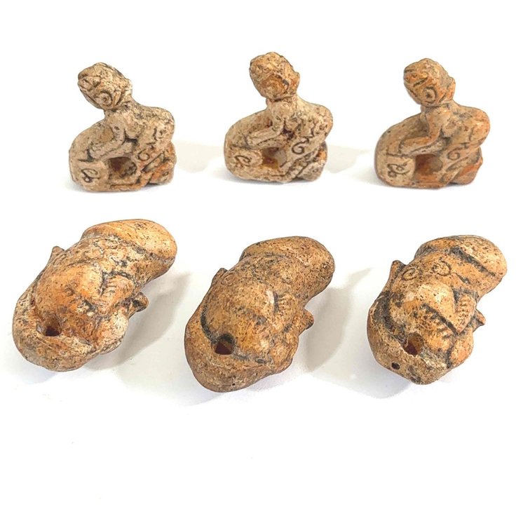 Antique Terracotta-Like Stone Carvings
