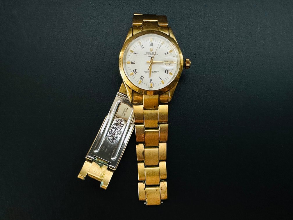 (Unverified Authenticity) Rolex Oyster Perpetual Date Watch - Needs Cleaning