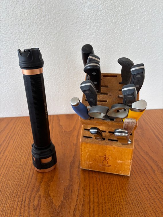 J.A. Henckels Knife Block with Knives and a Duracell Flashlight