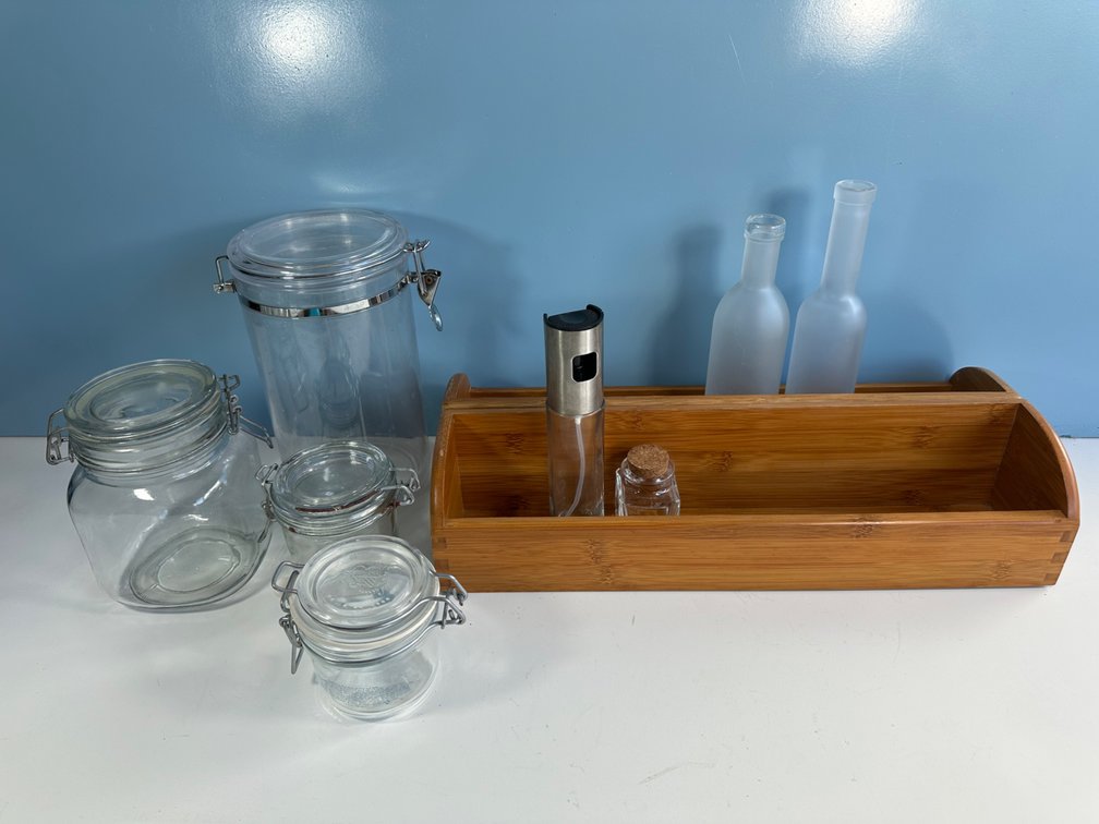 Assorted Glass Jars, Bottles, and Wooden Tray – Stylish and Functional