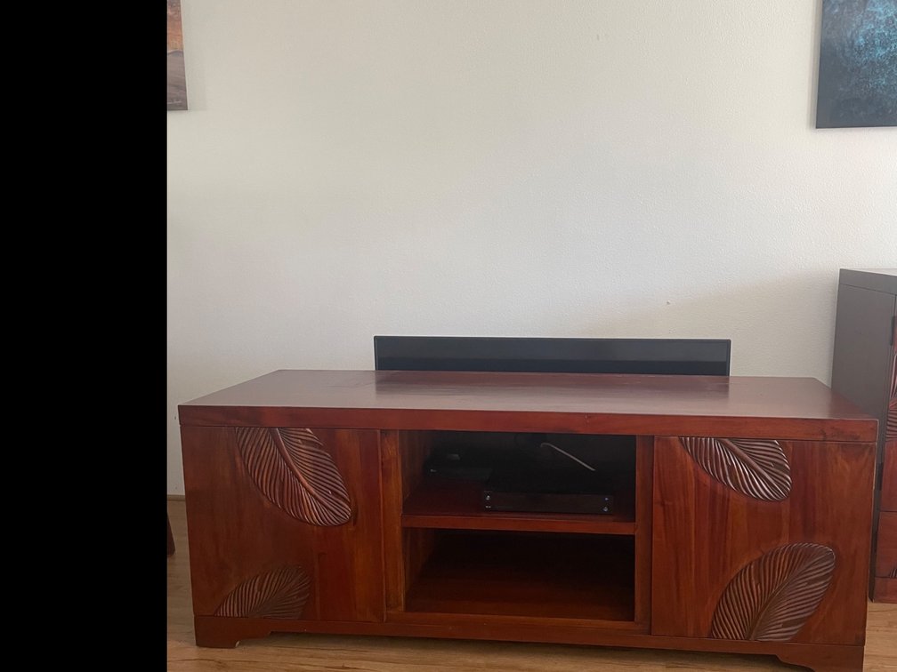 Wooden leaf stamped television table