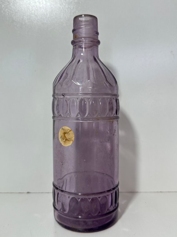Antique Amethyst Glass Bottle – Decorative Oval Patterned Collectible