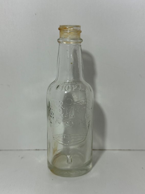 Vintage Clear Embossed Bottle – “TOP” Crown Design – Mini Collectible for Bottle Enthusiasts