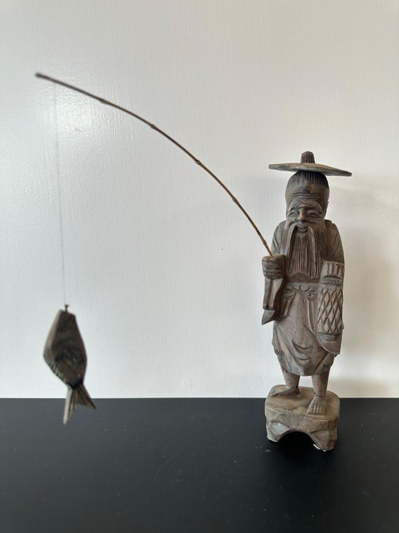 Hand-Carved Wooden Fisherman Figurine – Unique Folk Art Décor
