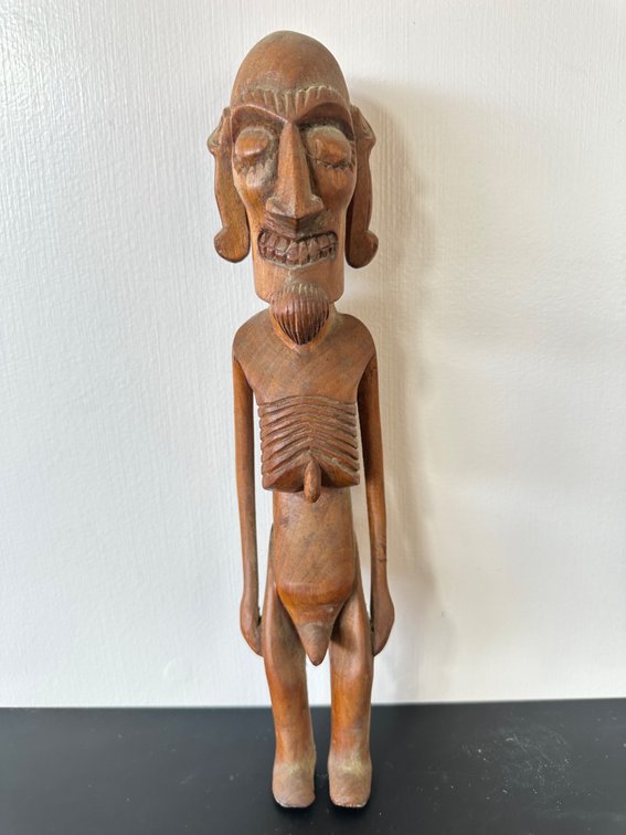 Hand-Carved Wooden Figure – Unique and Expressive Tribal Style