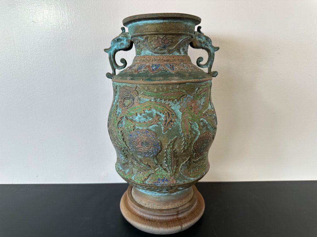Beautifully Detailed Decorative Vase with Elephant-Handled Design