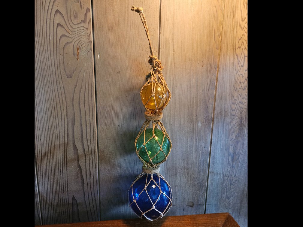 3 colored glass balls.