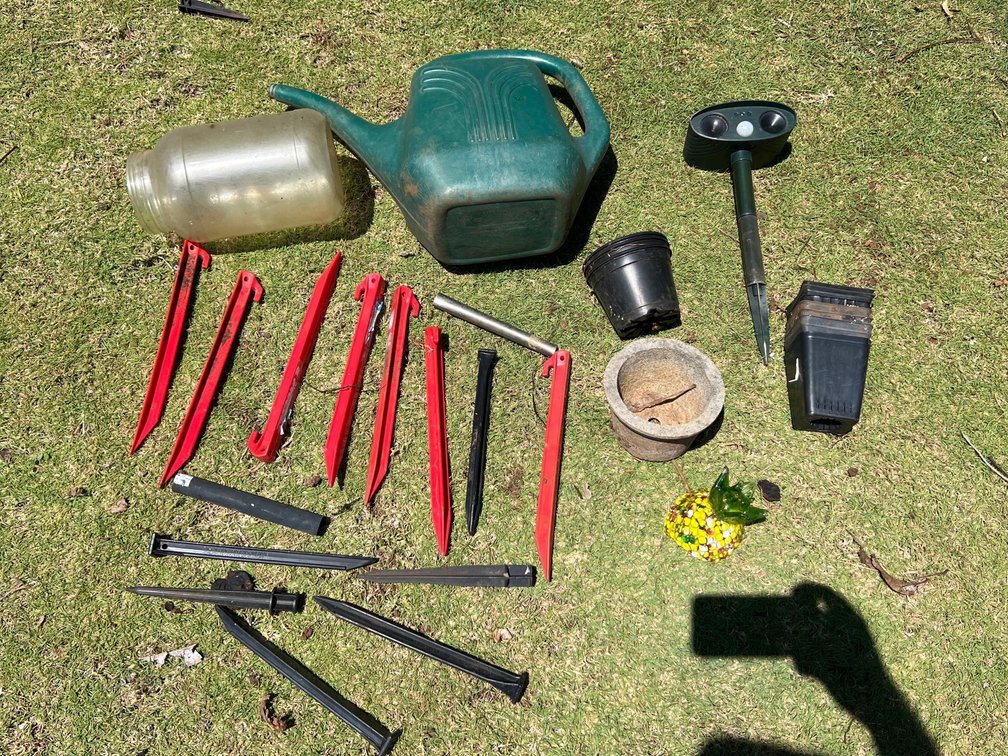 Stakes and water jug pots 