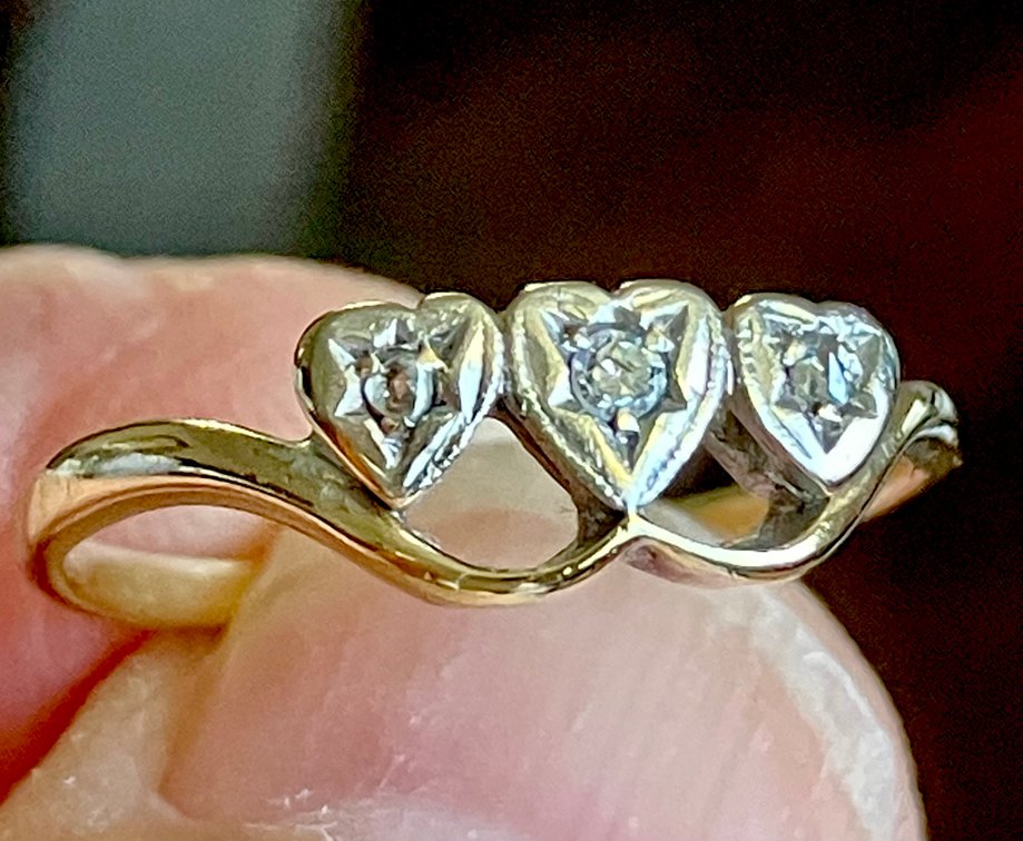 Estate.  3 Diamonds Set in a Very Cute minimalist design made from Genuine 9K Gold. This is a vintage Ring.