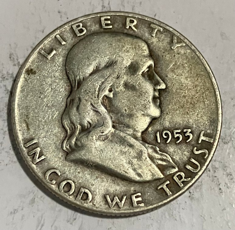 1953 D.  Benjamin Franklin half dollar