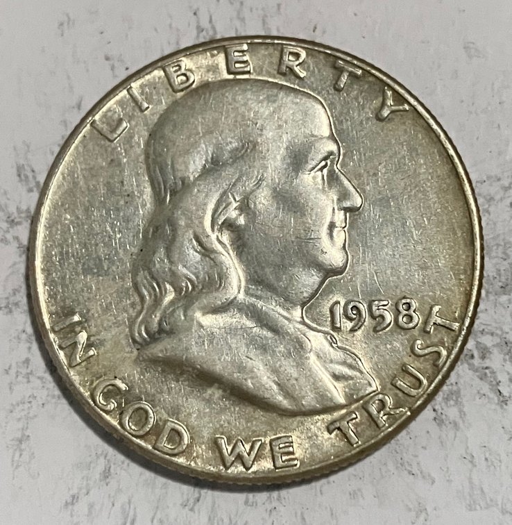 1958  Benjamin Franklin half dollar.  