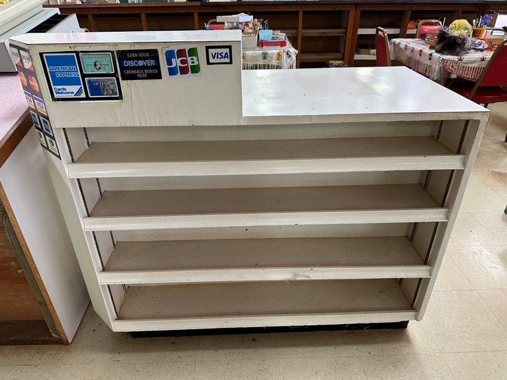 Retail Counter with Adjustable Shelving