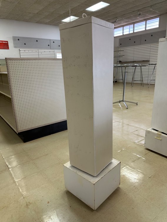 Rotating Magnetic Display Tower with Storage Base