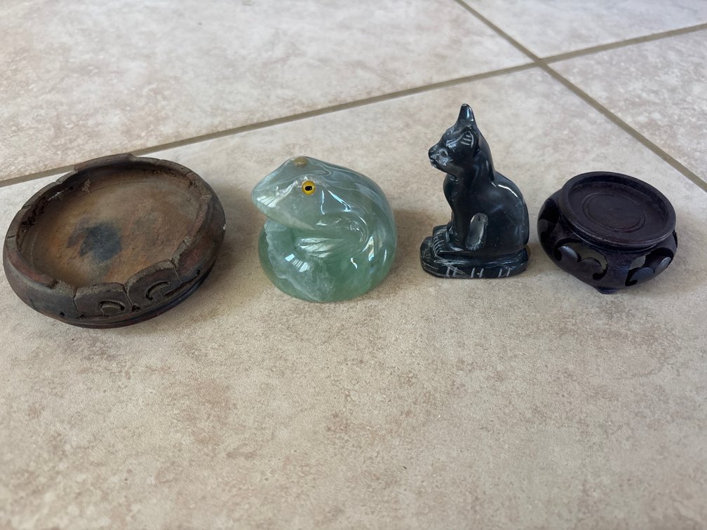 Stone Figurines and Wooden Stands 