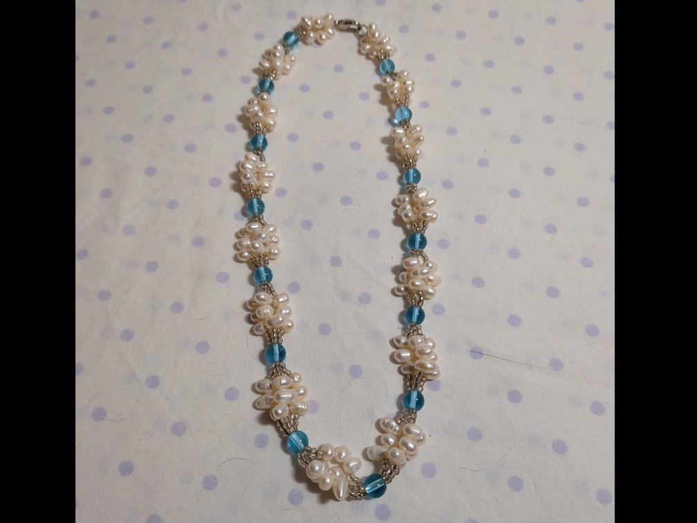 20" White freshwater pearl necklace with blue stone