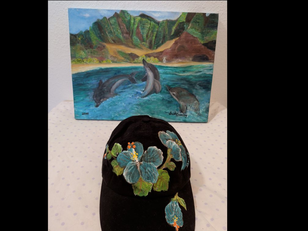 Island painting and hat