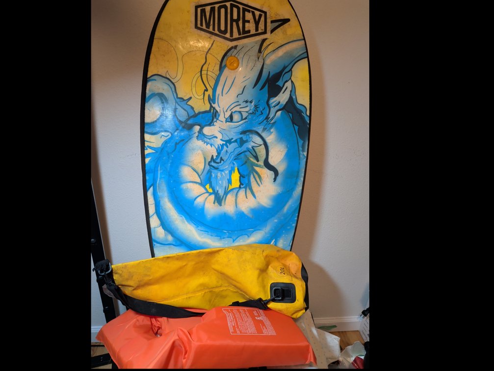 Dry bag, life jacket, boogie board