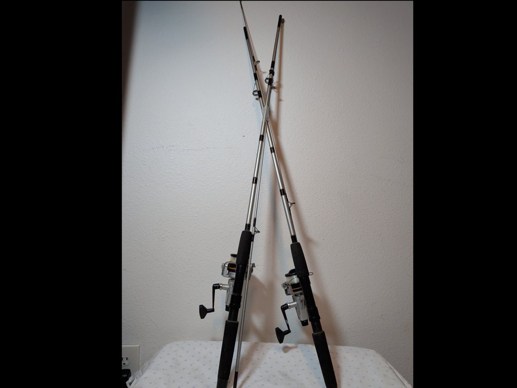 2 Abu Garcia fishing poles with reels