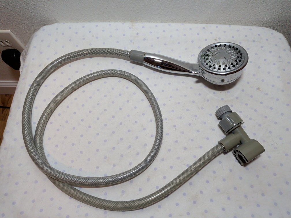 Shower head with hose extension 