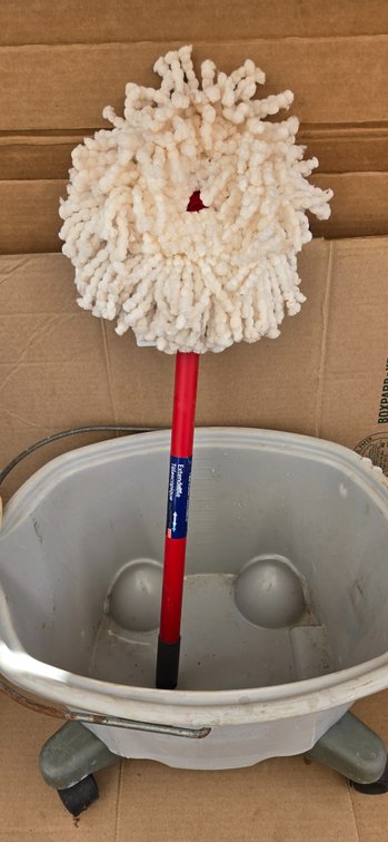 Dust mop and bucket on wheels