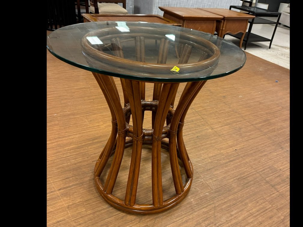 Rattan dining table with glass