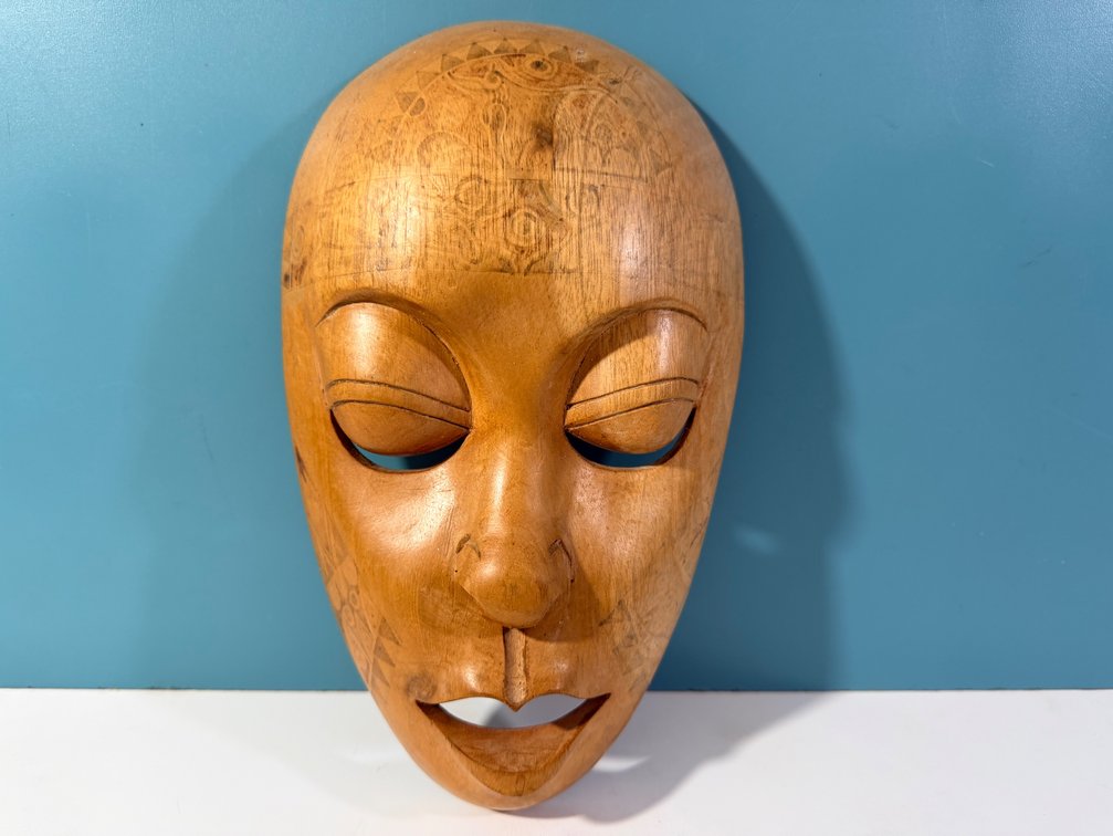Hand-Carved Wooden Decorative Mask with Natural Wood Finish