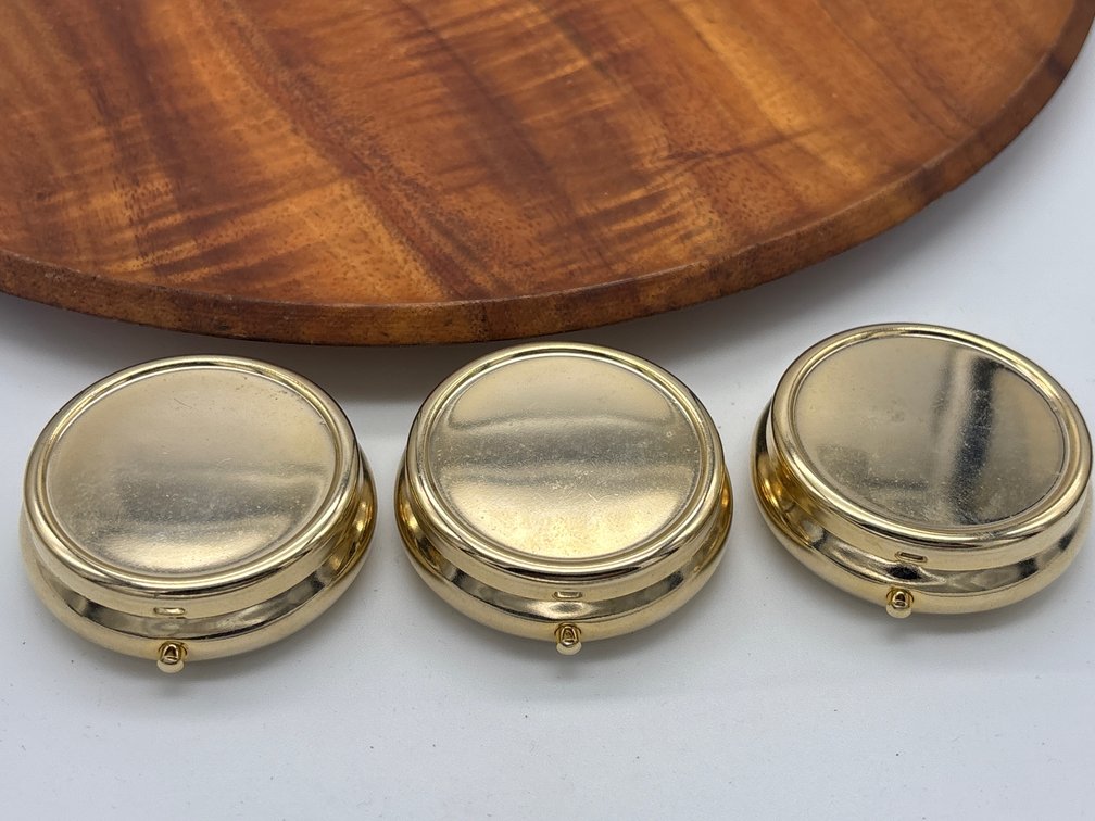 Three Gold Colored Hinged Containers