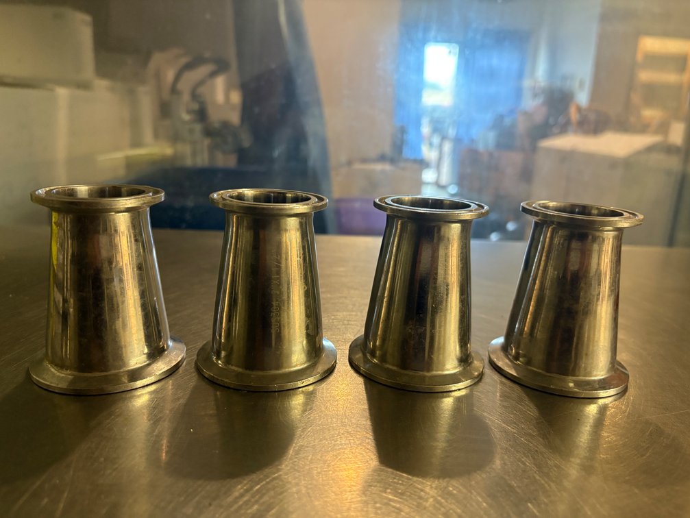 Lot of four Stainless Steel Refucers