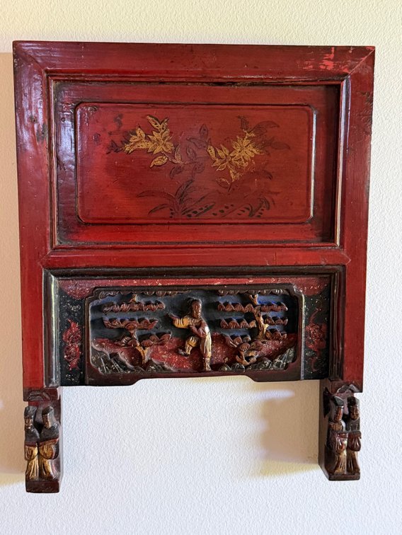 Red Lacquered Wall Panel with Carved Scene