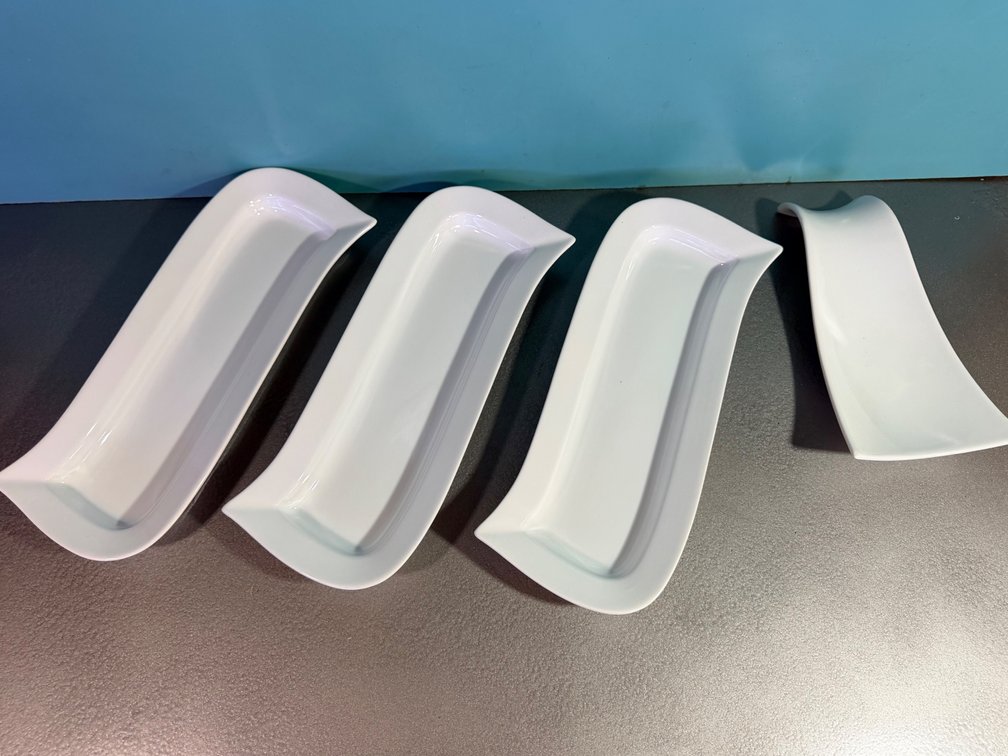 Set of Four White Curved Serving Dishes