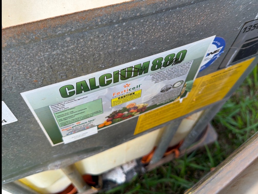 Container of FertiCell Calcium 880 Plus Plant Nutrient (Partial)