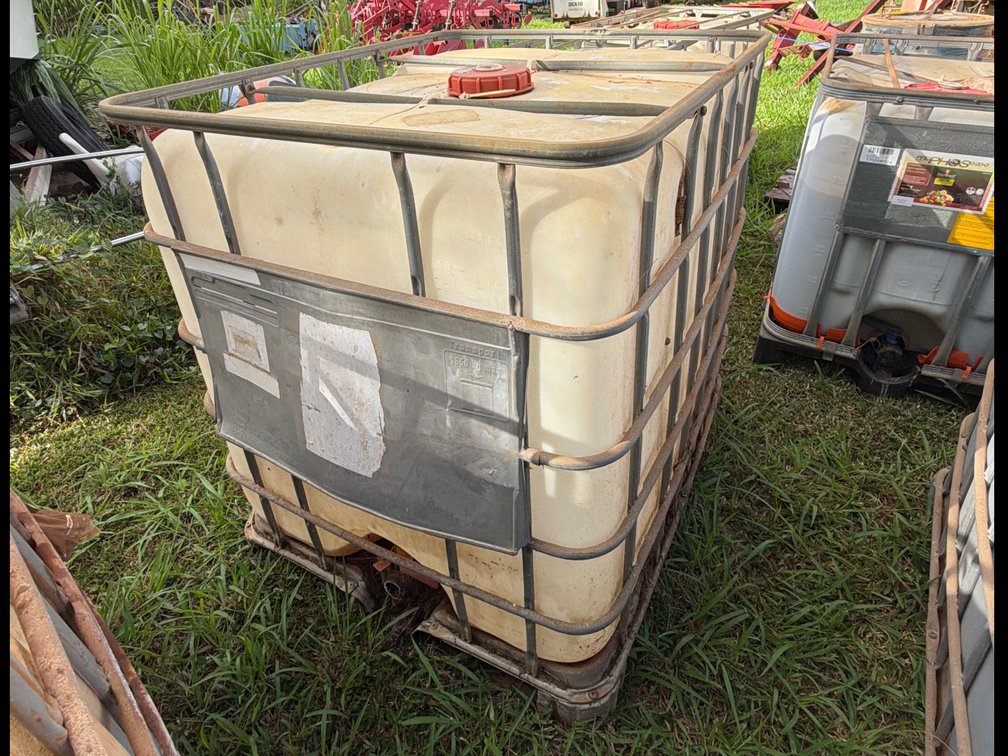 Empty Chemical Storage Container with Metal Grate