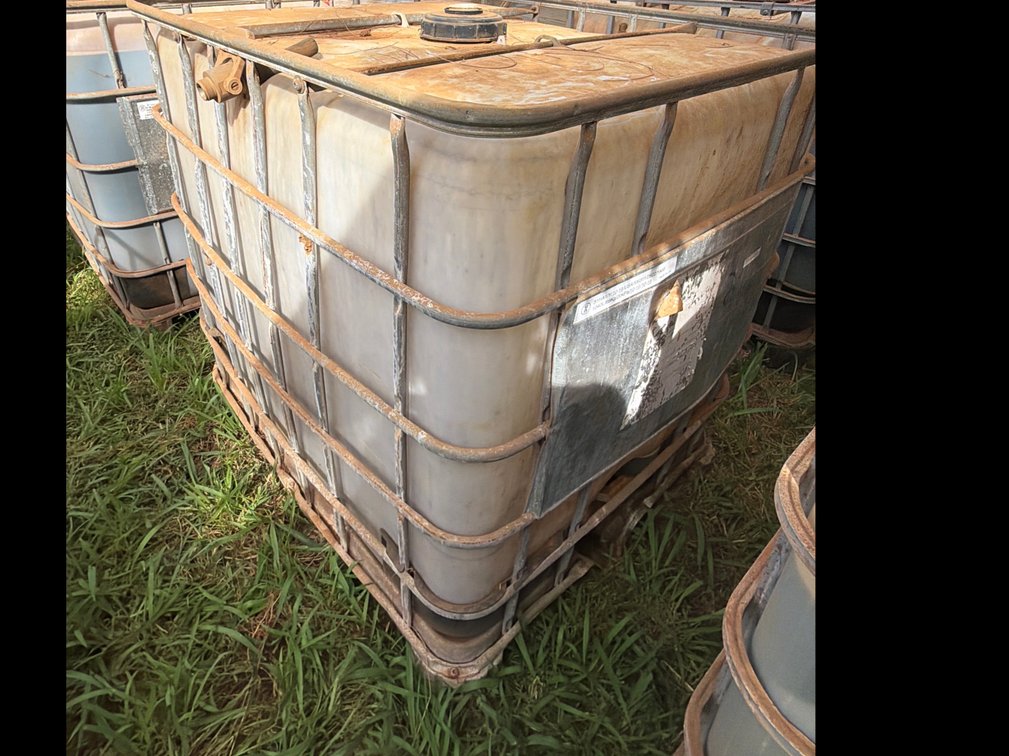 Tote with Metal Cage – Contains Unknown Liquid