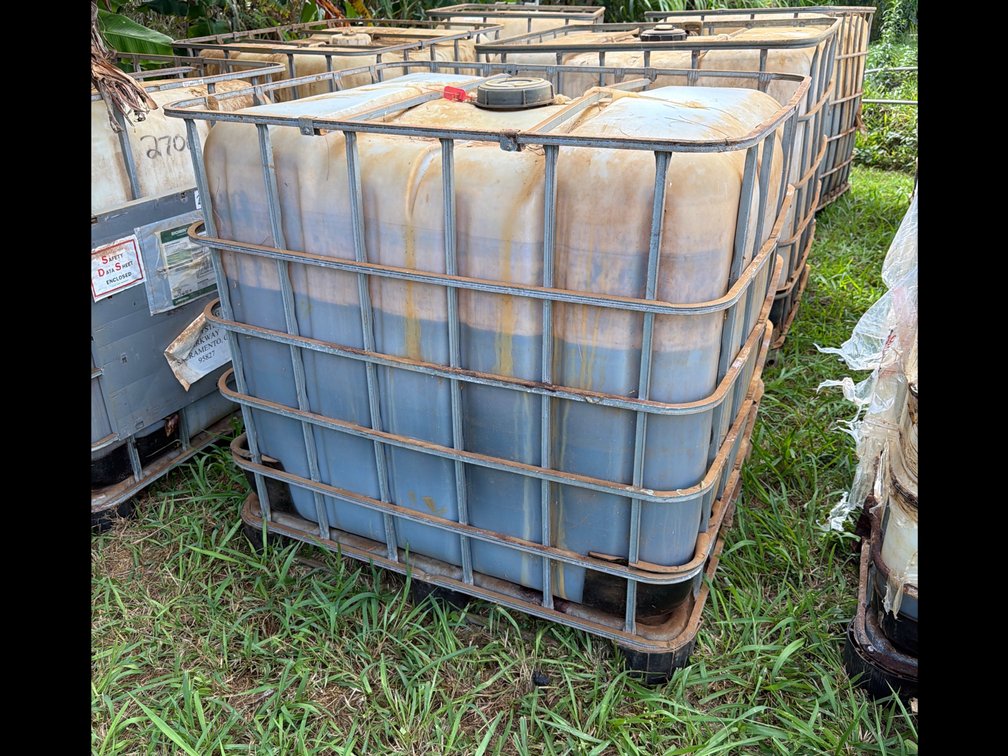 Tote with Metal Cage – Contains Unknown Liquid