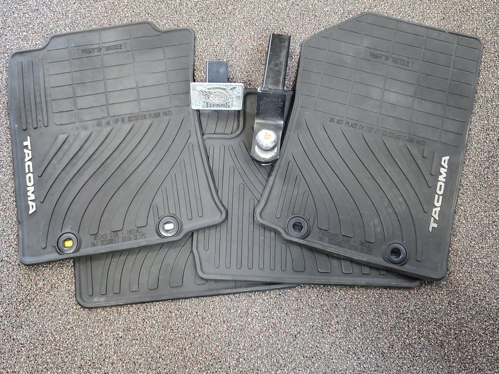 Toyota Tacoma Floor Mats, TN Titans Hitch Cover, & 2" Receiver Hitch.