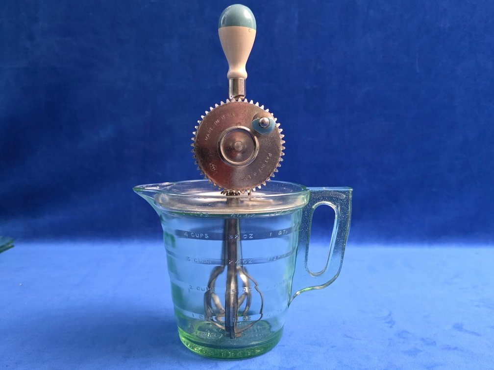 Vintage Hand Mixer with 4-cup Green Uranium Glass Measuring Cup.