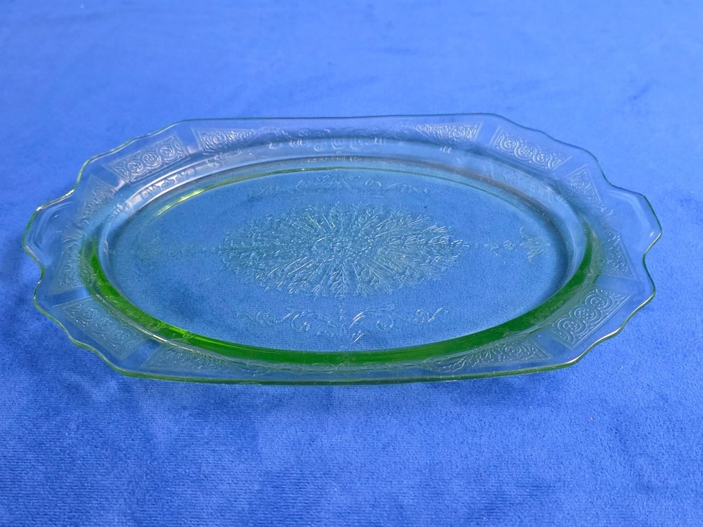 Green Uranium Glass Serving Platter in the "Princess" Pattern.