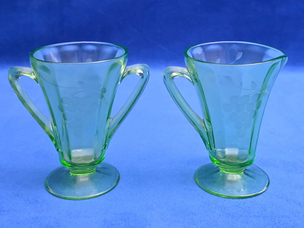 Vintage Green Uranium Glass Creamer and Sugar Set with Etched Grape Design.