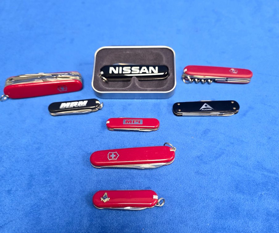 (8) Assorted Advertising Knives