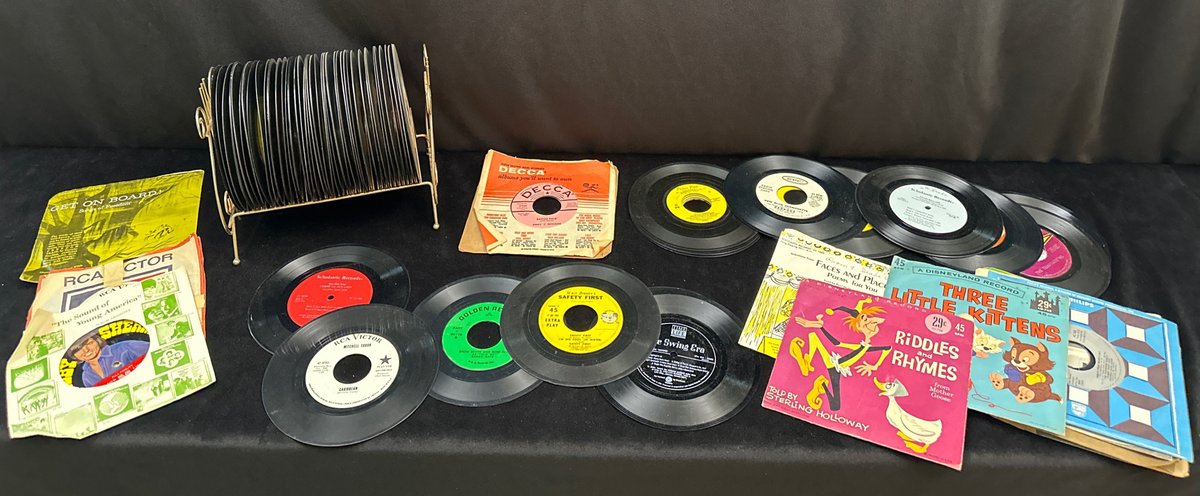 Record Stand with 45 RPM records (LPO)