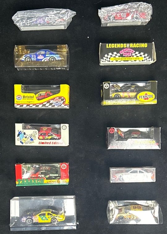 (12) Assorted 1/64 Scale NASCAR Die Cast Cars .