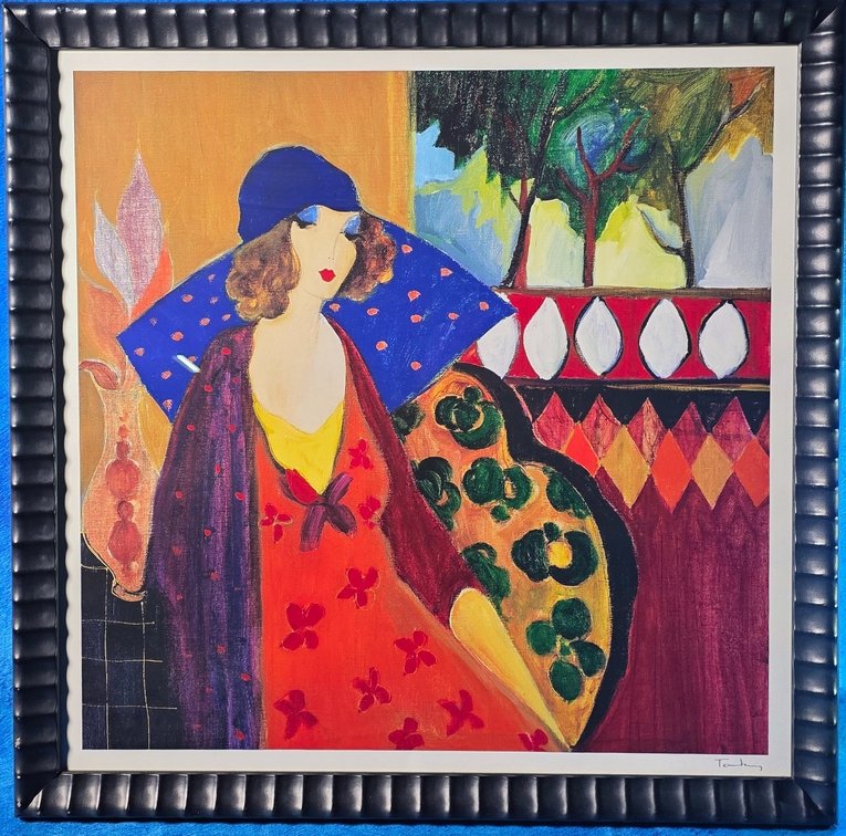 Framed "Indigo Chapeau" by artist Itzchak Tarkay.